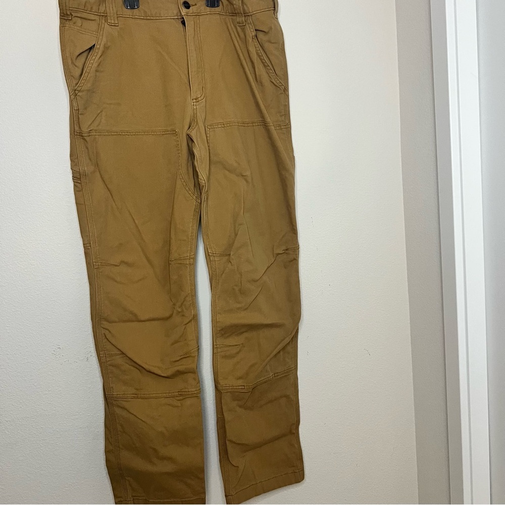 Carhartt 36X34
RELAXED FIT
BUILT TO SERVE AND PROTECT HARDWORKING PEOPLE men